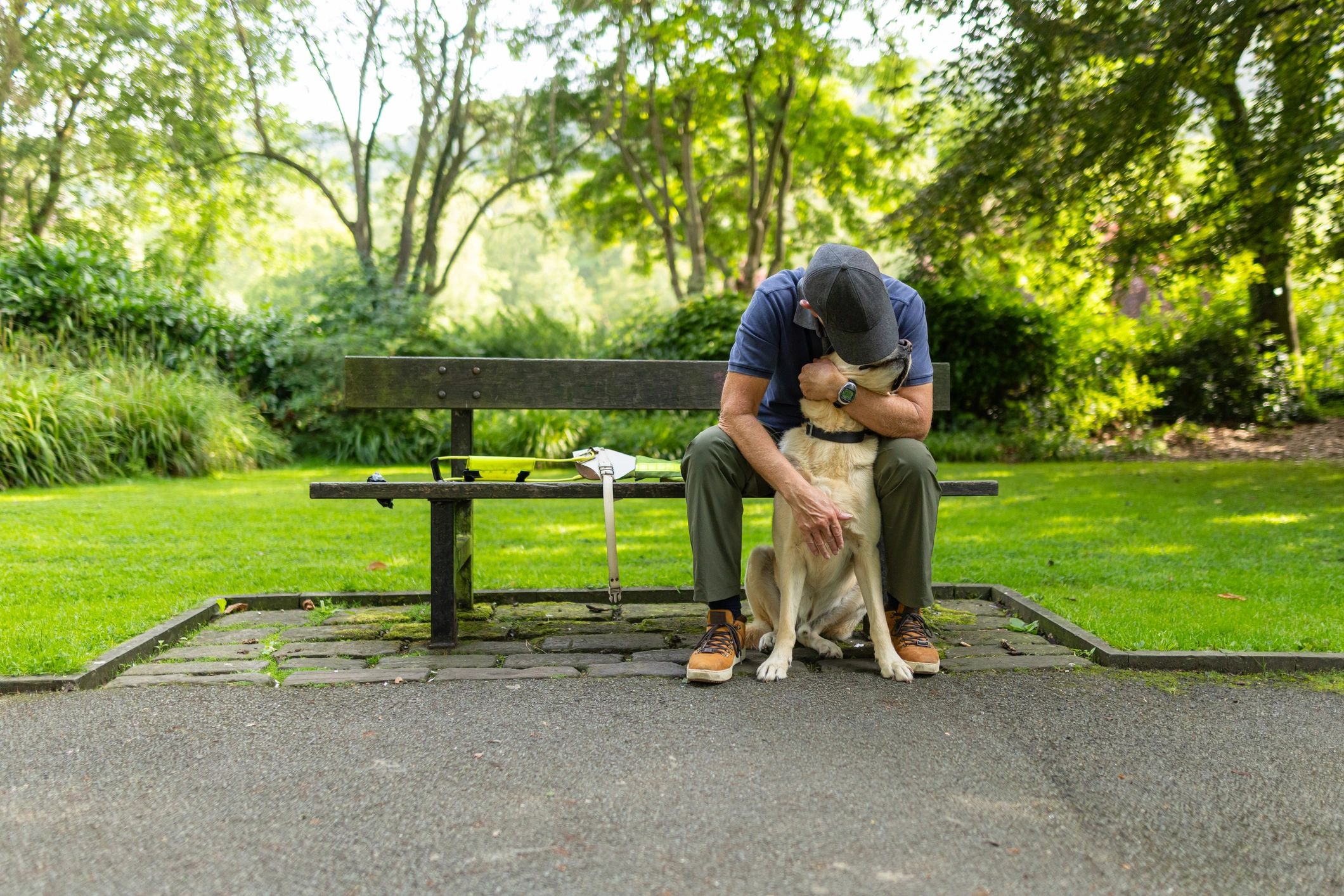 Professional dog owner with dog outdoors